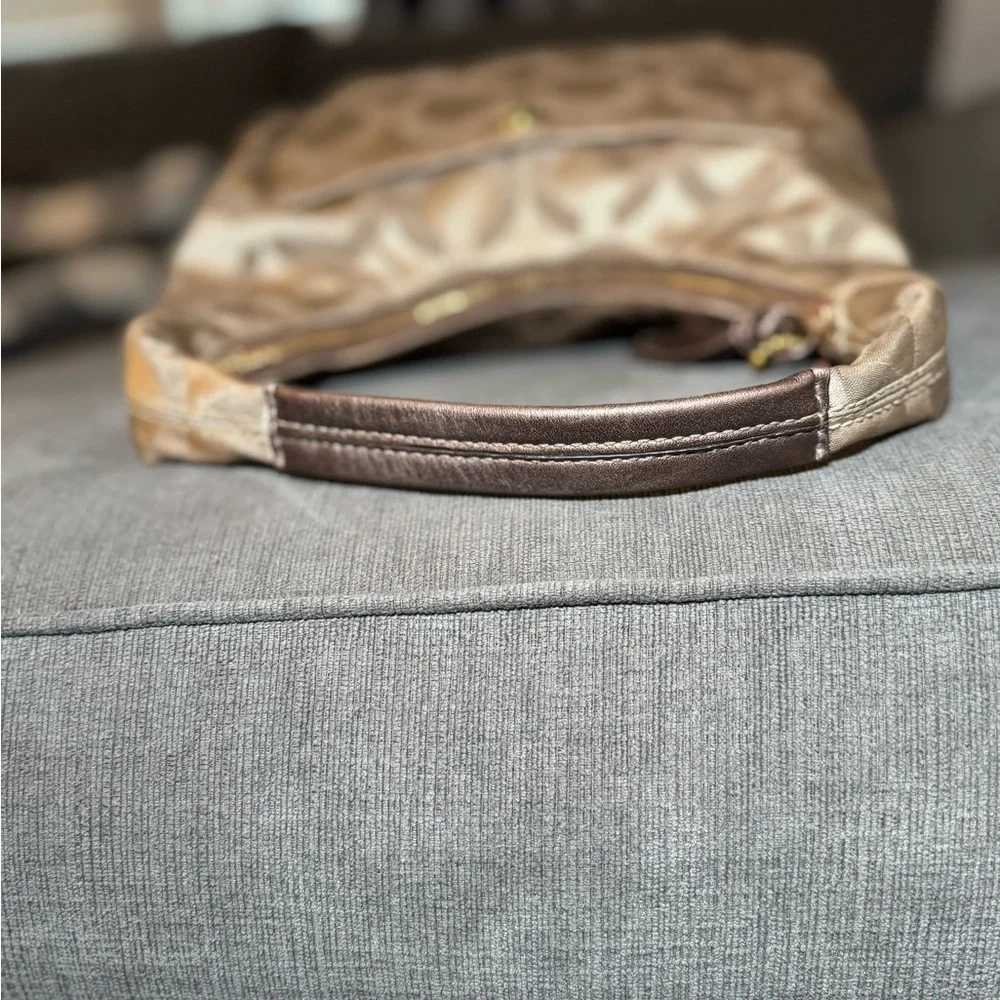 Coach Brown Signature One Shoulder Hobo Bag with bronze leather